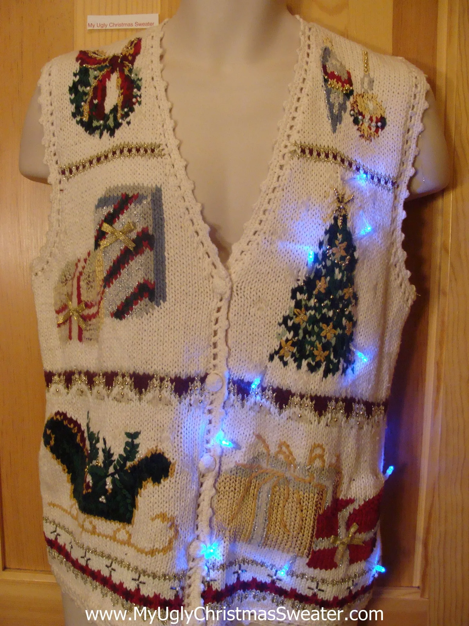 Need to Buy Christmas Sweaters? Ivory Light Up Sweater Vest with Sleigh